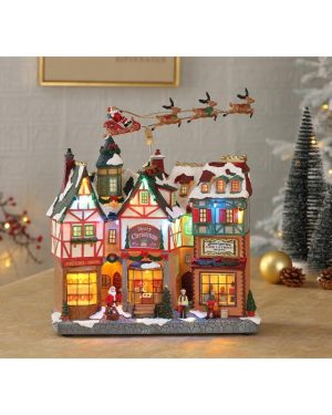 IL MONDO DEI CARILLON Scena del negozio di Natale con